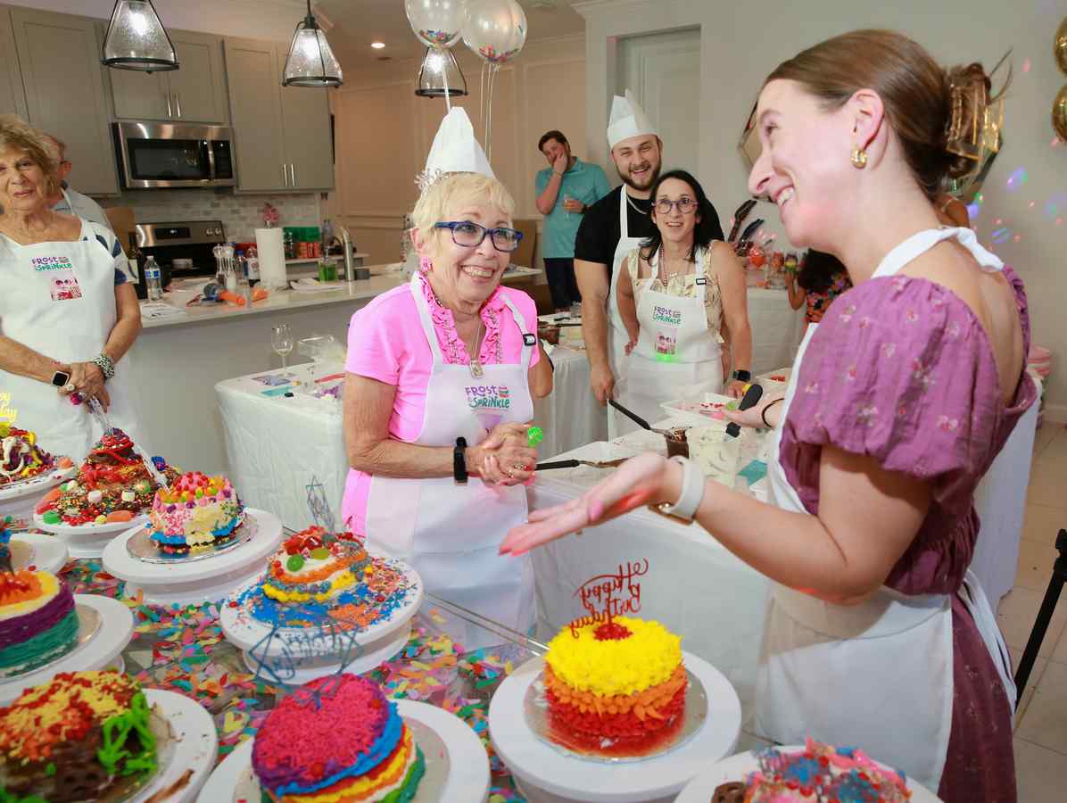 showing off decorated cake
